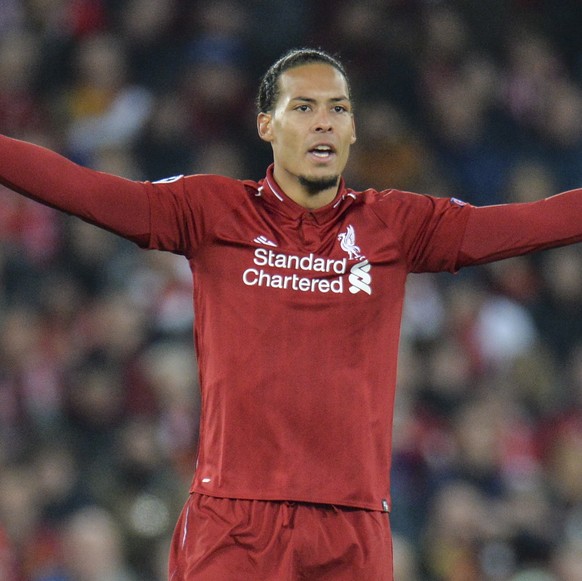 epa07495146 Liverpool's Virgil van Dijk reacts during the UEFA Champions League quarter final, first leg soccer match between Liverpool FC and FC Porto at Anfield in Liverpool, Britain, 09 April ...