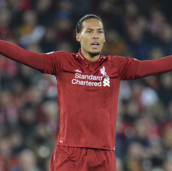 epa07495146 Liverpool&#039;s Virgil van Dijk reacts during the UEFA Champions League quarter final, first leg soccer match between Liverpool FC and FC Porto at Anfield in Liverpool, Britain, 09 April  ...