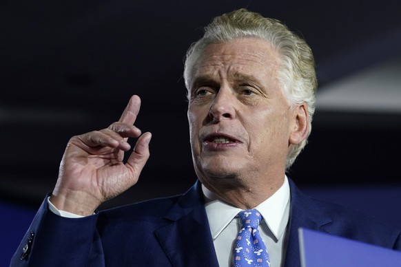 Democratic gubernatorial candidate Terry McAuliffe gestures as he speaks at an election night party in McLean, Va., Tuesday, Nov. 2, 2021. Voters are deciding between Democrat Terry McAuliffe and Repu ...
