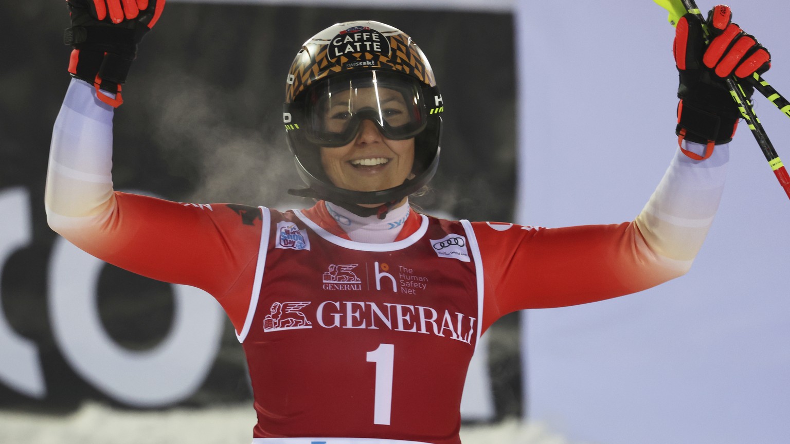 Switzerland's Wendy Holdener reacts after completing an alpine ski, women's World Cup slalom, in Levi, Finland, Sunday, Nov. 20, 2022. (AP Photo/Alessandro Trovati)