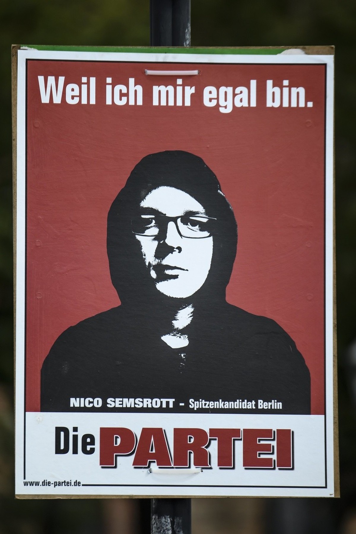 epa06128657 A campaign poster of the satirical party 'Die Partei' showing Berlin top candidate for the federal election in Germany, Nico Semsrott, reading 'Because I don't care abo ...