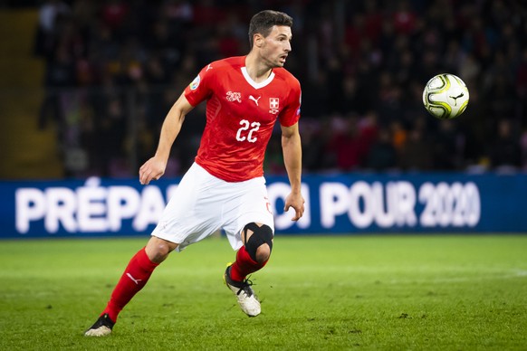 Switzerland&#039;s defender Fabian Schaer, in action during the UEFA Euro 2020 qualifying Group D soccer match between Switzerland and Republic of Ireland, at the Stade de Geneve, in Geneva, Switzerla ...