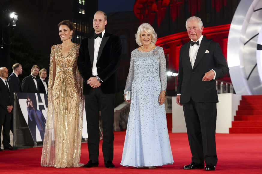 From left, Britain&#039;s Kate, the Duchess of Cambridge, Prince William, Camilla, the Duchess of Cornwall and Prince Charles, arrive for the World premiere of the new film from the James Bond franchi ...