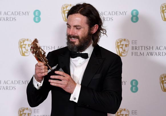 epa05789269 US actor Casey Affleck poses in the press room after winning the Best Actor award for his role in the film &#039;Manchester by the Sea&#039; during the 2017 EE British Academy Film Awards  ...