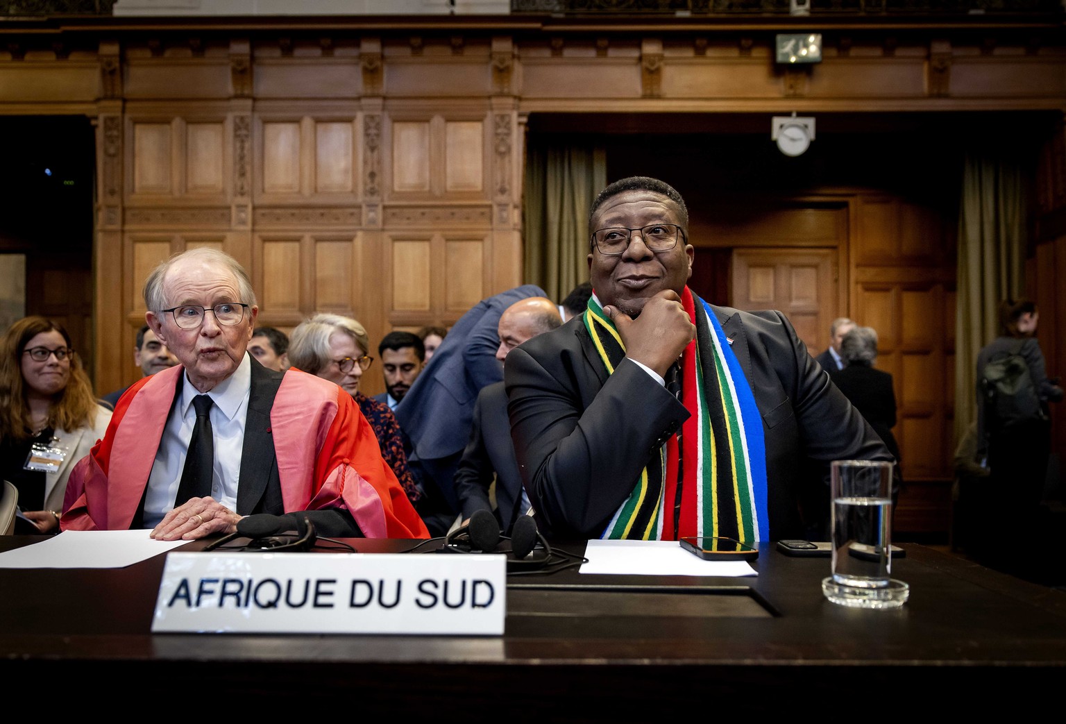 epa11366405 Ambassador Vusimuzi Madonsela (R) of South Africa looks on during a ruling by the International Court of Justice (ICJ) on the situation in Rafah, southern Gaza Strip, in the Hague, Netherl ...