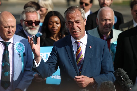 epa12940653 Reform Party leader Nigel Farage speaks at Havering Town Hall in London, Britain, 08 May 2026. Local elections took place across the United Kingdom on 07 May 2026. Early results show gains ...