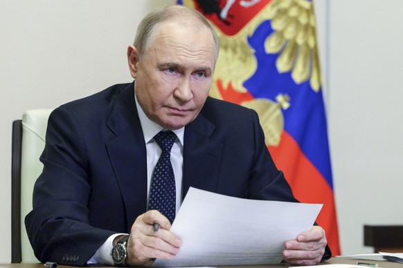 Russian President Vladimir Putin leads a cabinet meeting via videoconference at the Novo-Ogaryovo state residence outside Moscow, Russia, Wednesday, June 4, 2025. (Gavriil Grigorov, Sputnik, Kremlin P ...