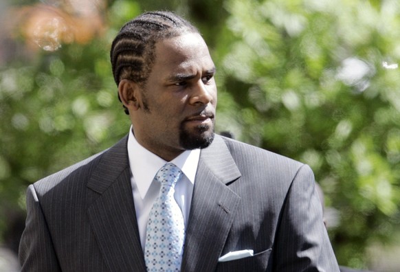 FILE - R&amp;B singer R. Kelly enters the Cook County Criminal Court Building, Wednesday, May 28, 2008, in Chicago. R. Kelly, the R&amp;B superstar known for his anthem