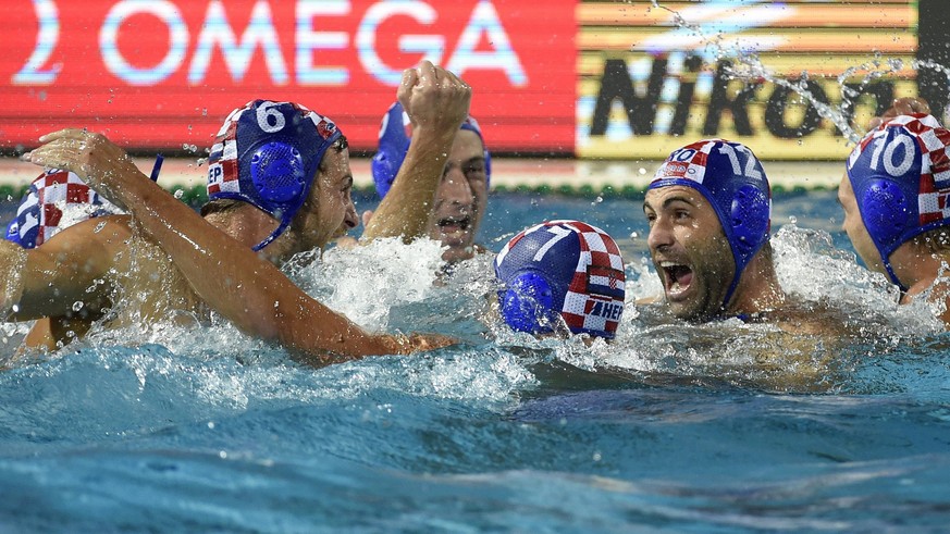 epa06116784 Players of Croatia celebrate after they won the men&#039;s water polo final match Hungary vs Croatia at the 17th FINA Swimming World Championships in Hajos Alfred National Swimming Pool in ...