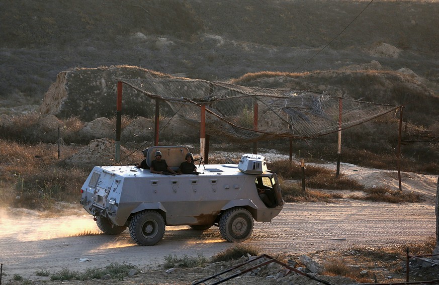 epa06077564 Egyptian security forces patrol near the Rafah border with Gaza Strip, 08 July 2017 (issued 09 July 2017). According to reports, at least 26 Egyptian military personnel were killed and 20  ...