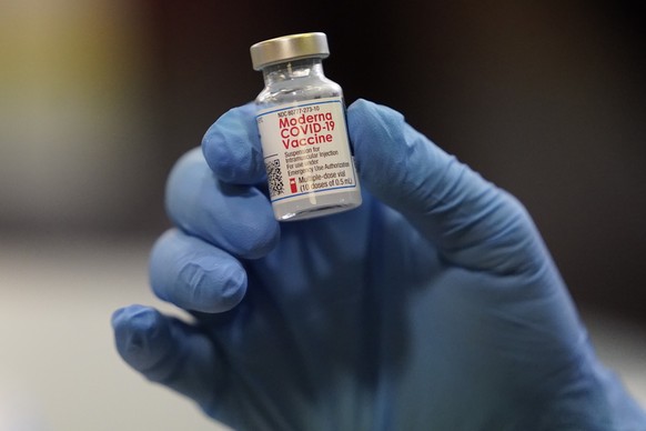 FILE - This Tuesday, Jan. 5, 2021 file photo shows a vial of the Moderna COVID-19 vaccine at a pop-up vaccine clinic in Salt Lake City. U.S. regulators expect to rule Wednesday, Oct. 20, 2021 on autho ...