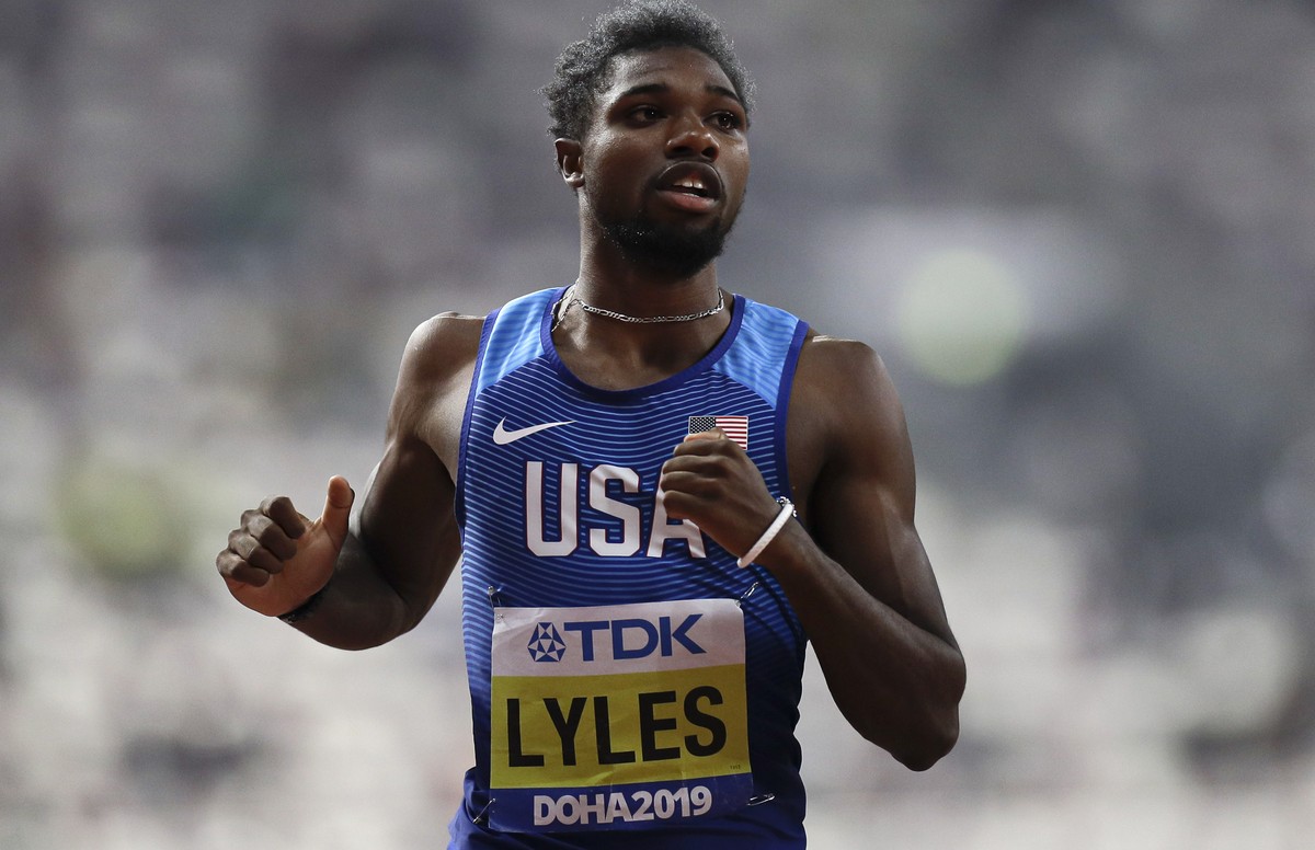 FILE - In this Sept. 29, 2019, file photo, Noah Lyles, of the United States looks at the scoreboard after a men's 200 meter heat at the World Athletics Championships in Doha, Qatar. Lyles is spen ...