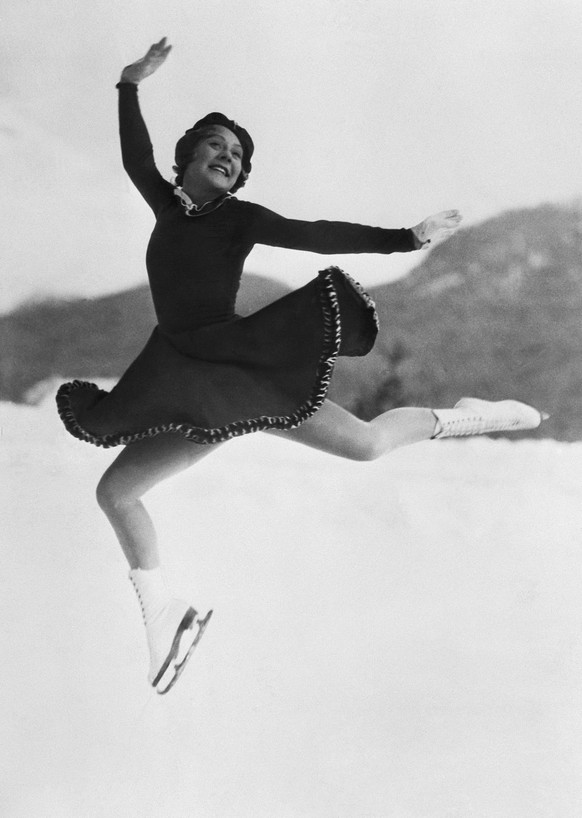 Sonja Henie leaps during her figure skating routine at the 1936 Winter Olympic Games in Garmisch-Partenkirchen, Germany. She is the defending gold medalist.