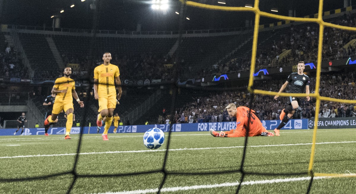 Zagreb's Mislav Orsic, right, scores to 1:1, against YB goalkeeper David Von Ballmoos, 2nd right, Gregory Wuethrich, left, and YB's Djibril Sow, during the UEFA Champions League football pla ...