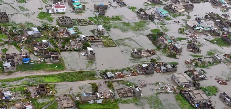 This image made available by International Federation of Red Cross and Red Crescent Societies (IFRC) on Monday March 18, 2019, shows an aerial view from a helicopter of flooding in Beira, Mozambique.  ...
