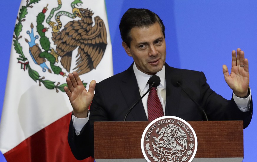 Mexican President Enrique Pena Nieto speaks during the inaugural session of the World Cancer Leaders Summit, at Palacio de Mineria in Mexico City, Tuesday, Nov. 14, 2017. (AP Photo/Rebecca Blackwell)