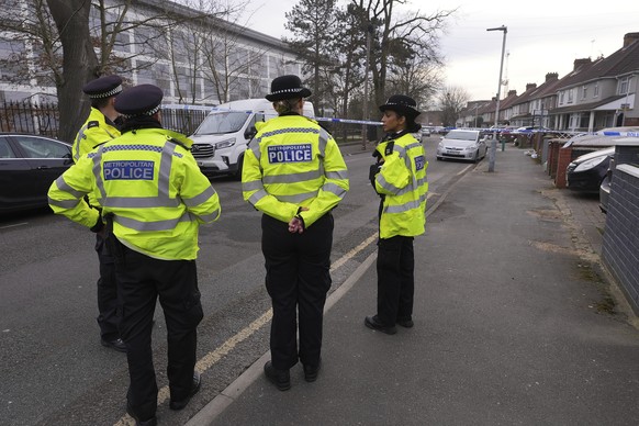 Police forces cordon off the area around the North Hyde electrical substation, which caught fire Thursday night and lead to a closure of Heathrow Airport in London, Friday, March 21, 2025.(AP Photo/Ki ...