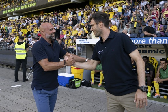 GC Trainer Giorgio Contini, links, und YBs Trainer Raphael Wicky, rechts, begruessen sich kurz vor dem Fussball Meisterschaftsspiel der Super League zwischen dem BSC Young Boys und dem Grasshopper Clu ...