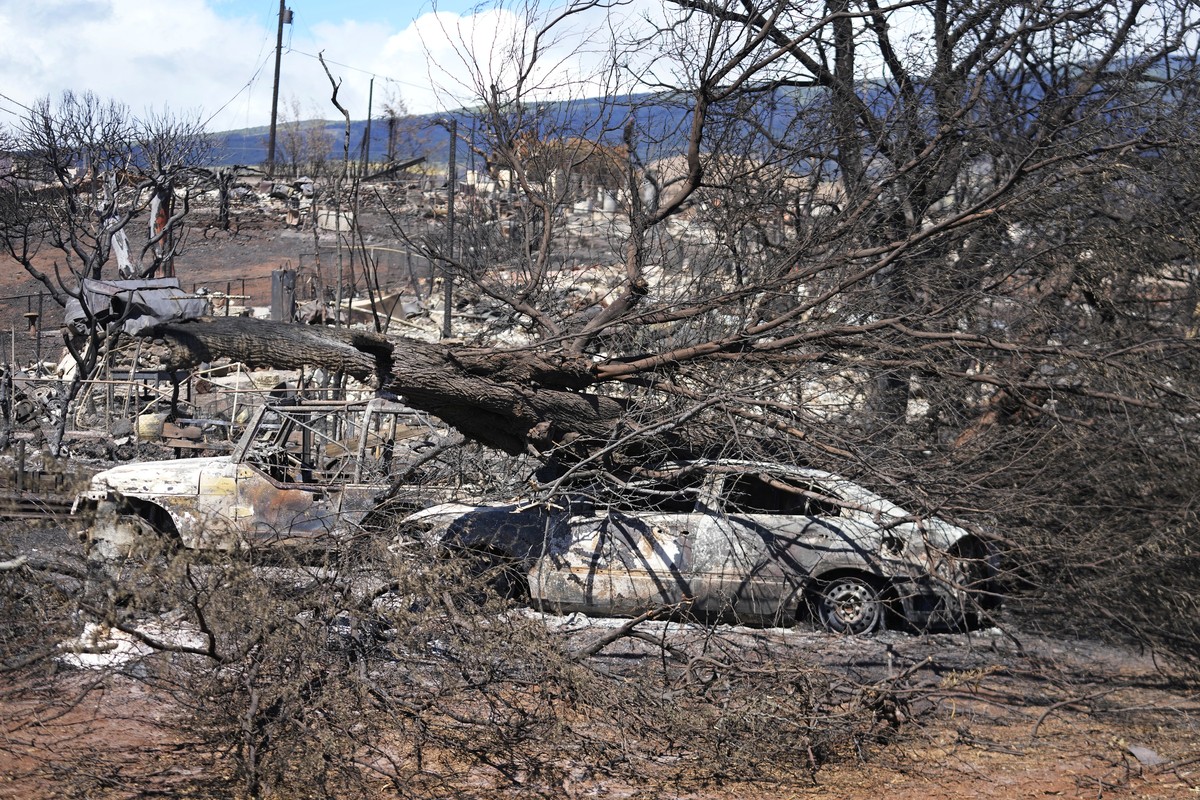 Destroyed property is seen, Sunday, Aug. 13, 2023, in Lahaina, Hawaii, following a deadly wildfire that caused heavy damage days earlier. (AP Photo/Rick Bowmer)