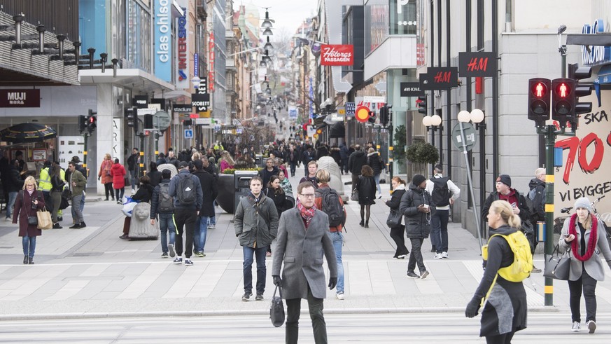 epa08337193 General view of the popular pedestrian Drottninggatan (&#039;Queen&#039;s Street&#039;) in Stockholm, Sweden, 01 April 2020. The streets of the Swedish capital are less crowded than usual  ...