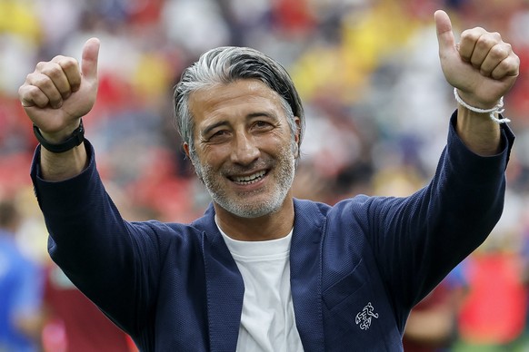 Switzerland's head coach Murat Yakin celebrates after the World Cup round of 16 soccer match between Switzerland and Colombia at the BC Place stadium in Vancouver, Canada, Tuesday, July 7, 2026,  ...