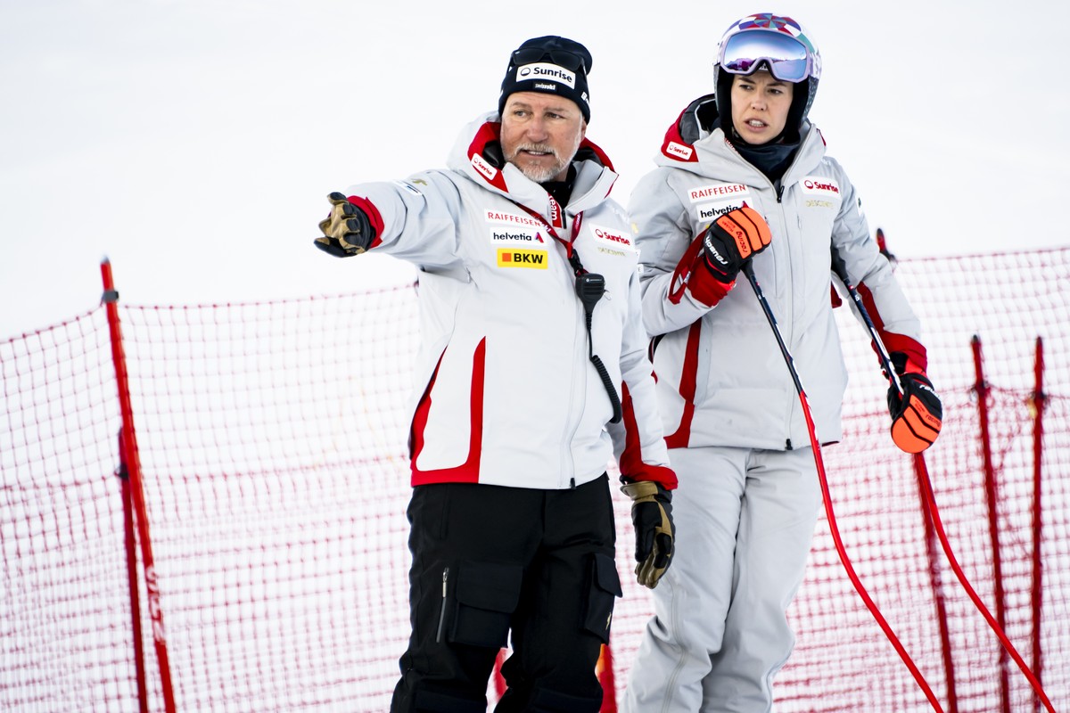 Stefan Abplanalp, speed coach for the Swiss-ski women's team speaks with Michelle Gisin of Switzerland before the women's Downhill training race at the Alpine Skiing FIS Ski World Cup, in St ...
