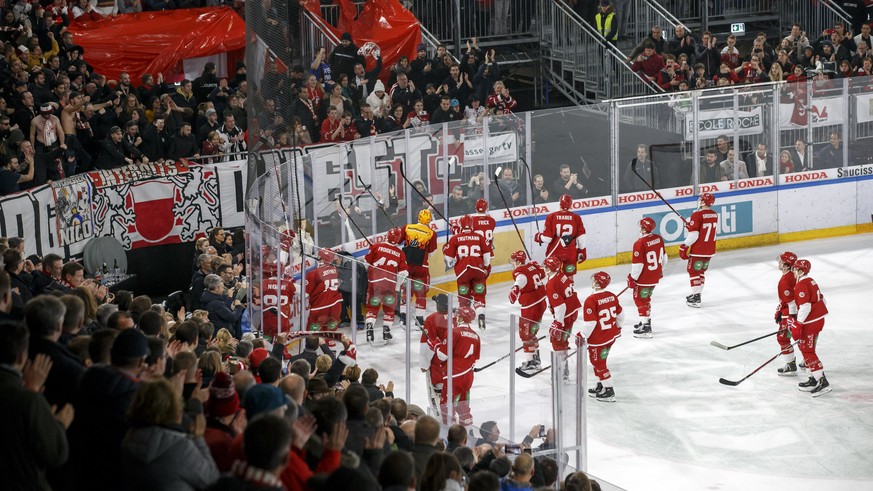 Lausanne&#039;s players celebrate their victory after beating Geneve-Servette, during a National League regular season game of the Swiss Championship between Lausanne HC and Geneve-Servette HC, at the ...