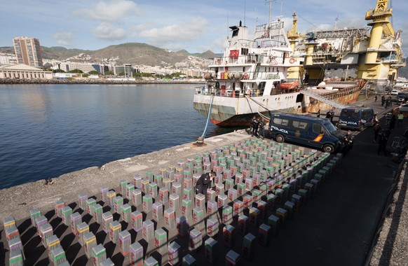 epa12644600 A cargo vessel seized by Spanish police and the Spanish Navy 535 km off the coast of the Canary Islands arrives at the port of Santa Cruz de Tenerife, Spain, 12 January 2026. A total of 9, ...