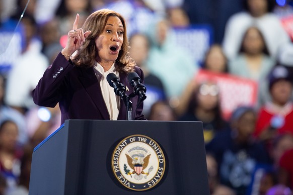 epa11683889 US Vice President and Democratic presidential nominee Kamala Harris speaks during a campaign rally at the Shell Energy Stadium in Houston, Texas, USA, 25 October 2024. Harris is running ag ...
