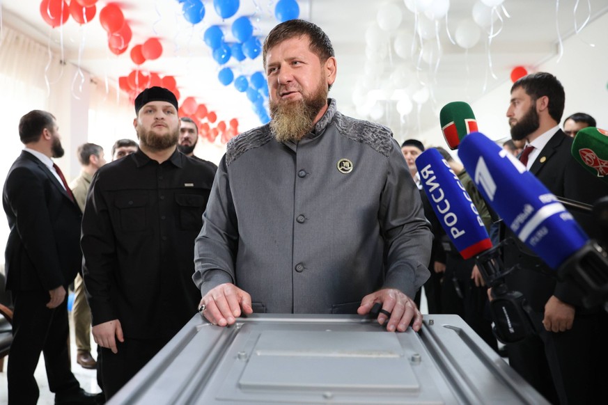 Russia Regions Parliamentary Election 9245972 18.09.2026 Head of the Chechen Republic Ramzan Kadyrov talks to journalists after voting at a polling station during elections to Russia s ninth State Dum ...