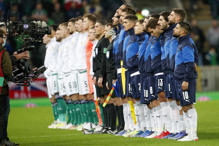 Italy line up for their national anthem prior to the start of the World Cup 2022 group C qualifying soccer match between Northern Ireland and Italy at Windsor Park stadium in Belfast, Northern Ireland ...