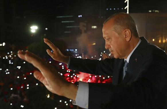 Turkey&#039;s President Recep Tayyip Erdogan, waves to supporters of his ruling Justice and Development Party (AKP) in Ankara, Turkey, early Monday, June 25, 2018. Erdogan won Turkey&#039;s landmark e ...