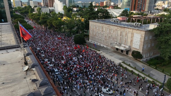 Protesters take part in a rally in Tirana, Saturday, June 6, 2026, against the construction of a massive coastal development project linked to Jared Kushner and Ivanka Trump at Narta lagoon area, west ...