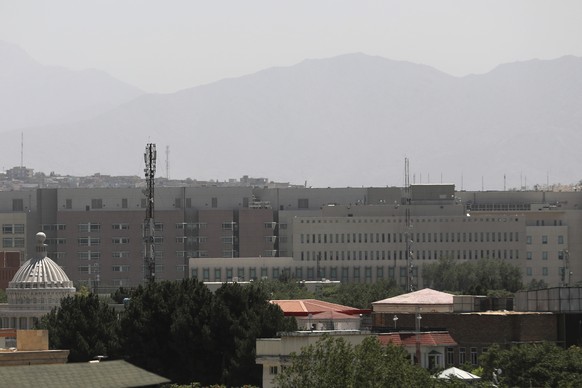 The U.S. Embassy buildings, center, are seen in Kabul, Afghanistan, Saturday, Aug. 14, 2021. The last-minute decision to send 3,000 U.S. troops to Afghanistan to help partially evacuate the U.S. Embas ...