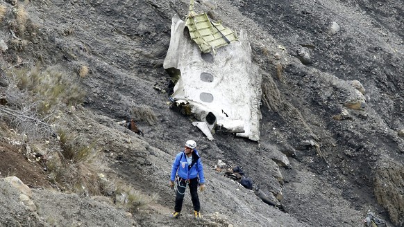epa04986411 YEARENDER 2015 MARCH
A search and rescue worker at the crash site of the Germanwings Airbus A320 that crashed in the French Alps, above the town of Seyne-les-Alpes, southeastern France, 2 ...