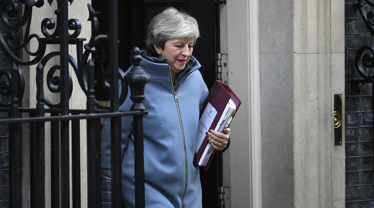 British Prime Minister Theresa May leaves 10 Downing Street, London, for the House of Commons to face Prime Minister's Questions, in London Wednesday, Feb. 20, 2019. Britain’s foreign secretary s ...