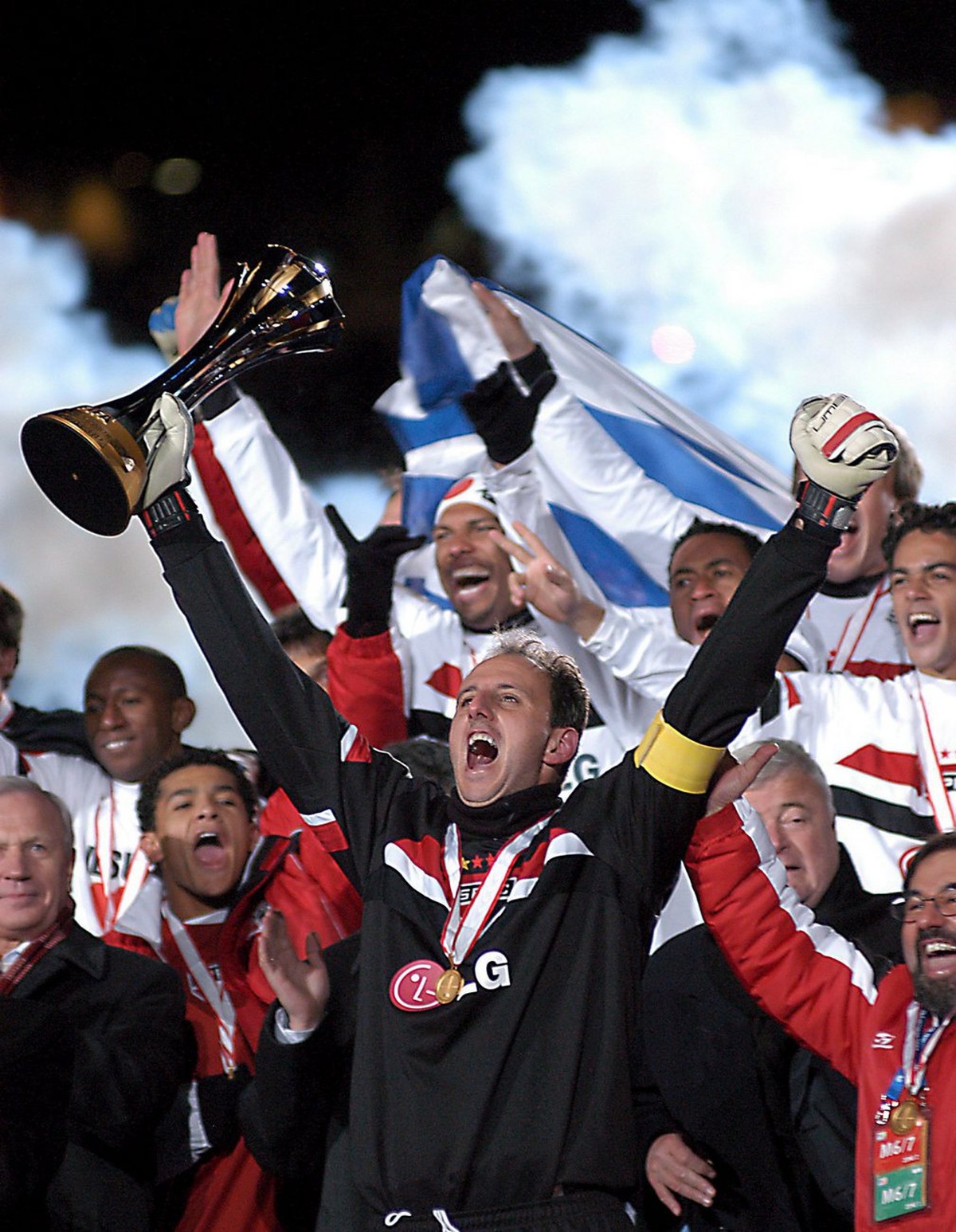 Sao Paolo FC goalkeeper and captain Rogerio Ceni holds up the World Club Championship Toyota Cup following his team's win against European Champions Liverpool in the final in Yokohama, Japan, Sun ...
