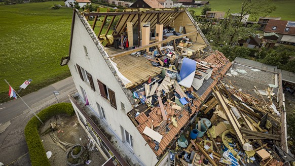 A house with its room torn off is pictured after violent storm swept through the city of La Chaux-de-Fonds, Switzerland, Switzerland, Monday, July 24, 2023. A storm swept across part of the canton of  ...