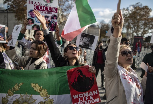 epa10329782 Protesters take part in a freedom rally for Iranian Women in Istanbul, Turkey, 26 November 2022. After the death of Mahsa Amini the Iranian people, especially women and youth, took to the  ...