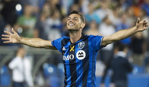 Montreal Impact&#039;s Blerim Dzemaili celebrates after scoring against Minnesota United FC during second half MLS soccer action in Montreal, Saturday, Sept. 16, 2017. (Graham Hughes/The Canadian Pres ...