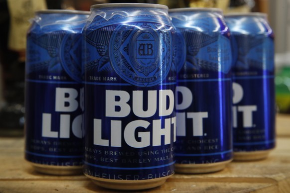 FILE - Cans of Bud Light beer are seen, Thursday Jan. 10, 2019, in Washington. On Friday, April 7, 2023, Anheuser-Busch InBev has reported a drop in U.S. revenue in the second quarter as Bud Light sal ...