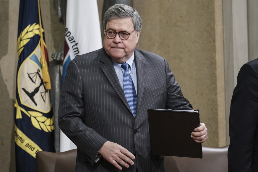 FILE - In this Jan. 22, 2020, file photo, Attorney General William Barr arrives for an ceremony at the Department of Justice in Washington, to announce the establishment of the Presidential Commission ...