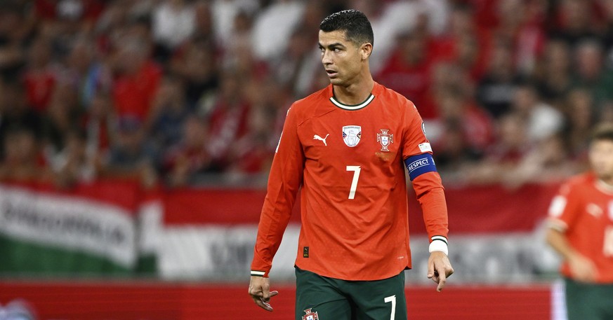 Portugal&#039;s Cristiano Ronaldo walks on the pitch during a World Cup 2026 group F qualifying soccer match between Hungary and Portugal at the Puskas Arena in Budapest, Tuesday, Sept. 9, 2025. (AP P ...