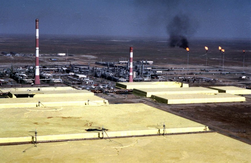 Rectangular slabs of hardened sulfur proliferate at Tengiz, the biggest oil field in Kazakhstan, June 24, 2001. The sulfur is a byproduct of the poisonous hydrogen sulfide gas found along with the oil ...