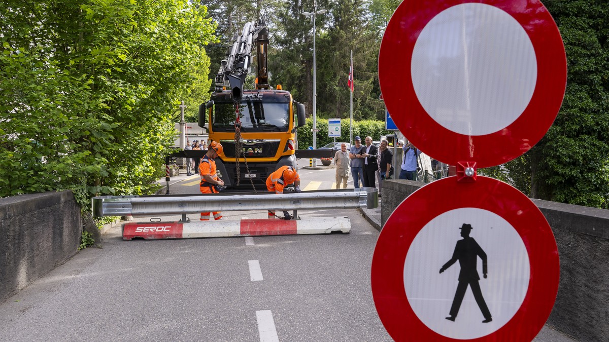 epa13030999 Workers place concrete barriers on a street to block access to the Hermance customs post, near Geneva, Switzerland, 11 June 2026, at the Franco-Swiss border during the G7 summit in nearby  ...