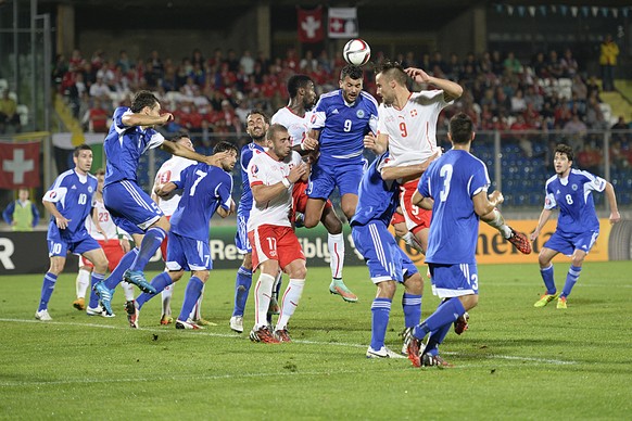 Switzerland&#039;s Blerim Dzemaili, hidden, scores during the UEFA EURO 2016 group E qualifying soccer match between San Marino and Switzerland at the San Marino Stadium in San Marino, on Tuesday, Oct ...