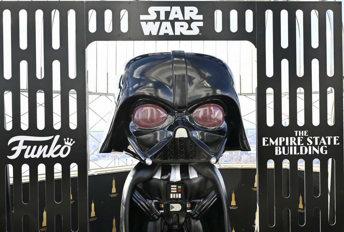 A Funko Darth Vader toy character installation is part of the Star Wars themed Empire State Building takeover on Thursday, March 21, 2024, in New York. (Photo by Evan Agostini/Invision/AP)