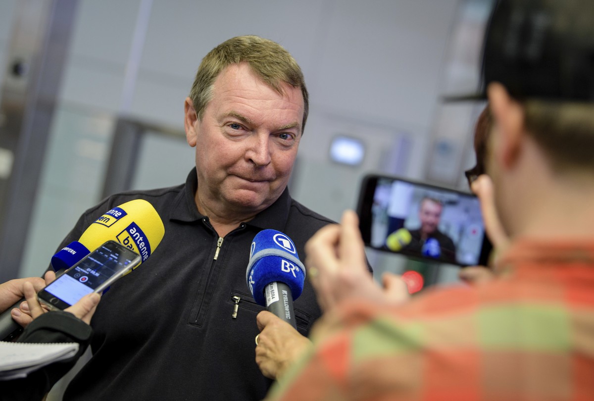 Claus-Peter Reisch, captain of the migrant rescue ship "Lifeline" gives interviews after arriving at the airport in Munich, southern Germany, Monday, July 16, 2018. (Matthias Balk/dpa via AP ...