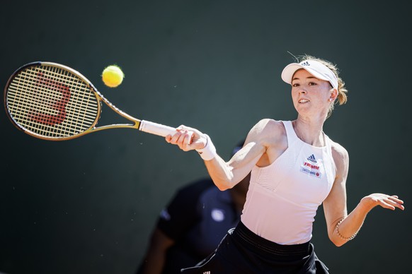 Simona Waltert from Switzerland returns a ball to Olga Danilovic from Serbia during their quarter final match at the WTA International Ladies Open Lausanne tennis tournament, in Lausanne, Switzerland, ...