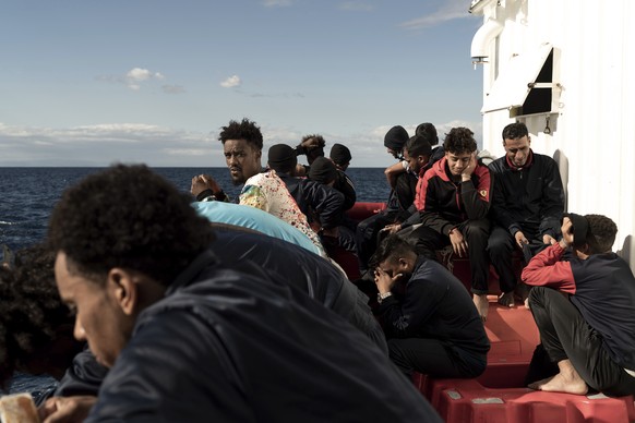 Migrants on the deck of the 